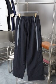발렌시아가 BALENCIAGA 링 로고 자수 배색 방수 트레이닝 팬츠