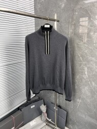 톰브라운 반집업 니트